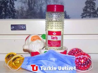 Suojamaski, joulupukki ja kologne